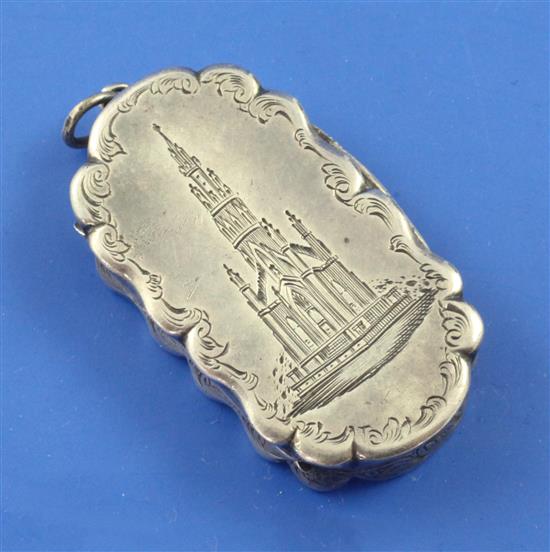 A Victorian silver vinaigrette chased and engraved with the Sir Walter Scott Memorial in Edinburgh, 1.75in